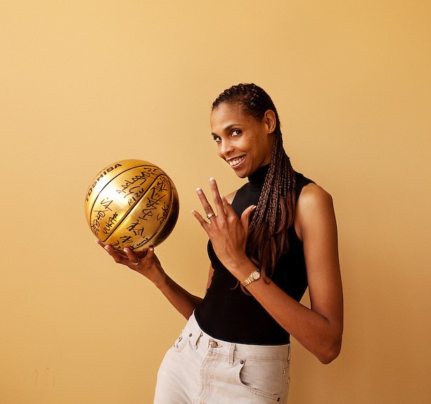 Woman holding a basketball in Dublin, Ohio.
